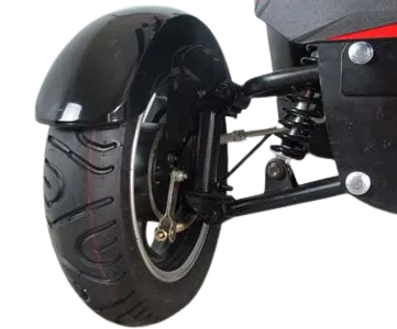 Close-up of rear wheel suspension on a red four-wheel electric golf mobility scooter for enhanced comfort