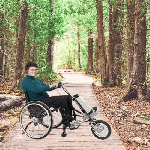 Electric wheelchair motor attachment for manual wheelchairs, featuring a compact design, powerful motor, and disc braking system for enhanced mobility and ease of use.
