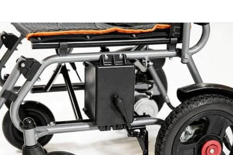eVolt Traveler Power Chair folded, highlighting its compact and portable design for easy storage and transport.