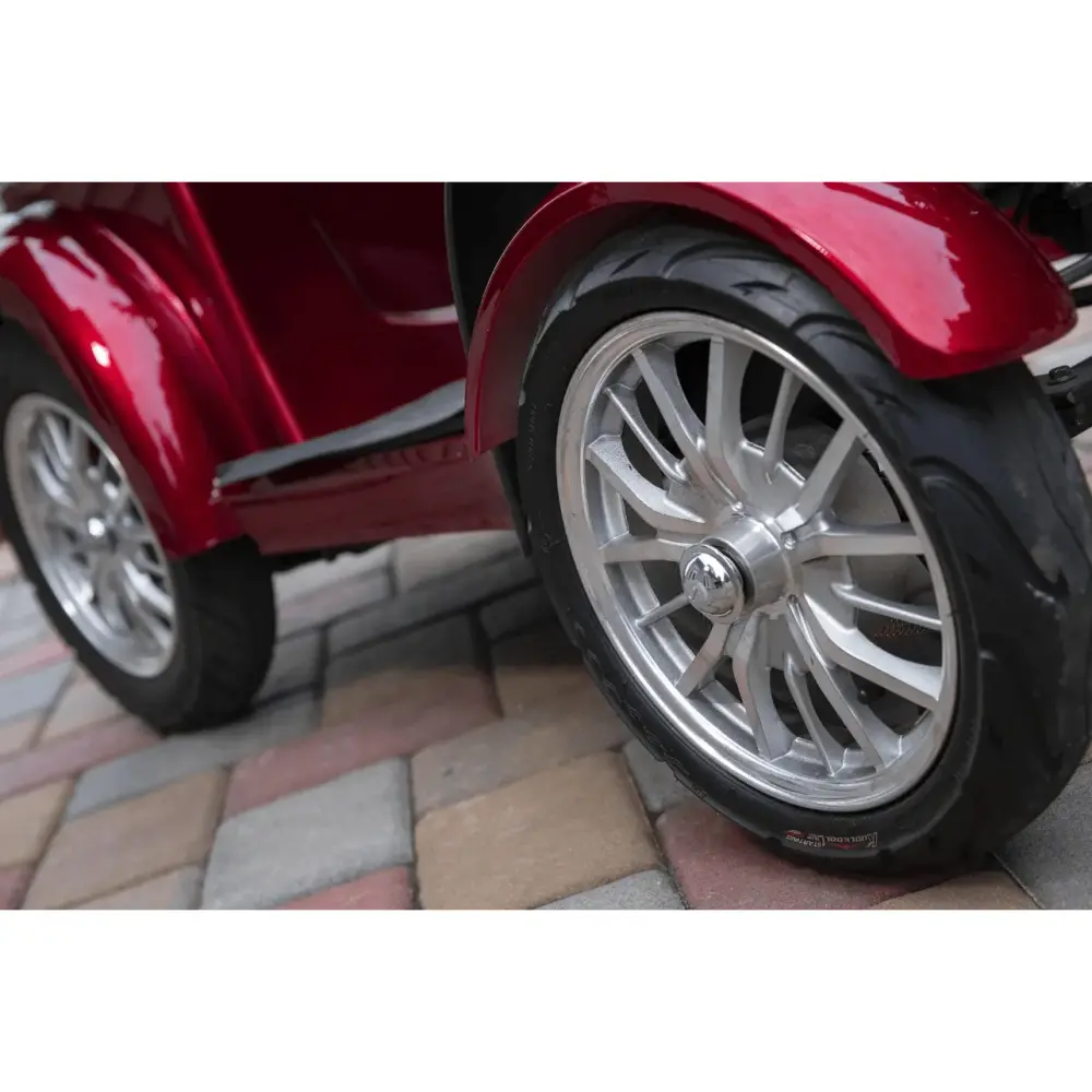 Red Elephant Scooter flat-free all-terrain suspension tire close-up