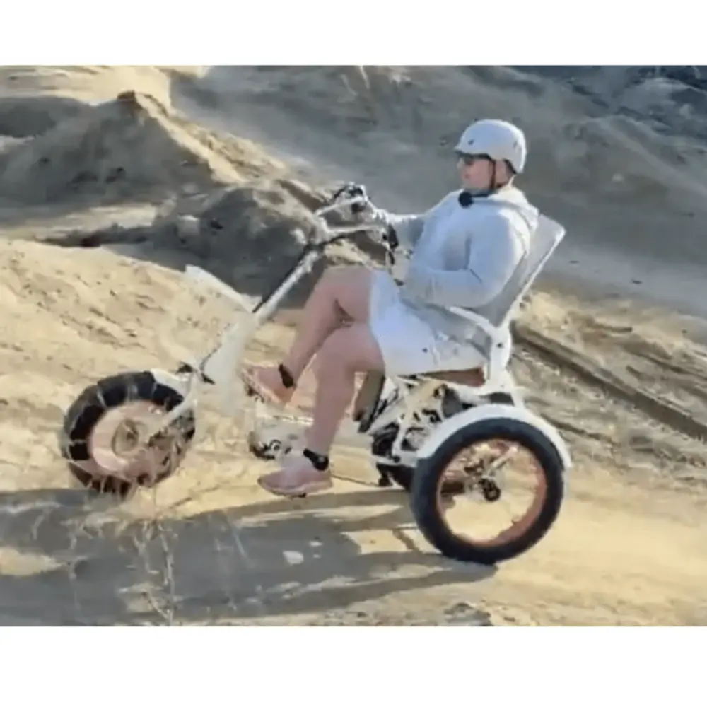 Person On Simple Glide Fat Tire On Hilly Terrain